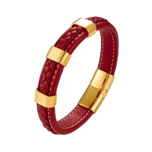 Close-up of red braided leather bracelet with golden rings and magnetic clasp