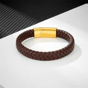 Men's braided brown leather bracelet with sleek gold magnetic clasp on modern background