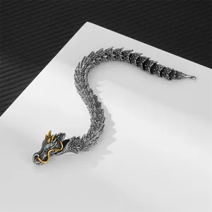 Bracciale drago vintage in acciaio inossidabile con baffi dorati e occhi in gemme blu