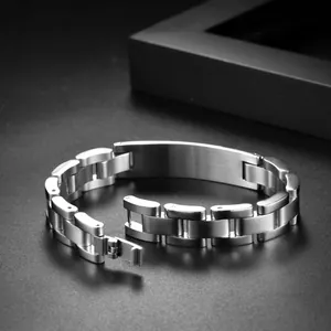 Detail of brushed 316L stainless steel bracelet with matte concave ID plate for men