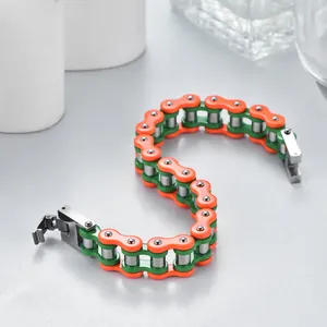 Fashionable orange and green industrial bicycle chain bracelet in stainless steel