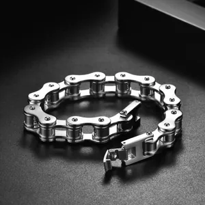 Macro detail of industrial silver bicycle chain bracelet in high quality stainless steel