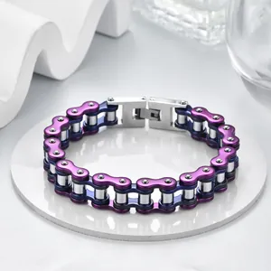 Detail of bicycle chain link bracelet in purple and blue polished stainless steel