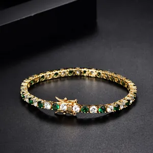 Classic gold tennis bracelet featuring emerald green and white round-cut zircon stones