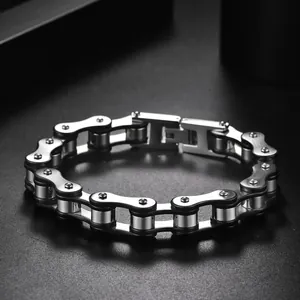 Close-up of industrial silver and black stainless steel bicycle chain link bracelet