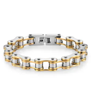 Detailed macro of a two-tone stainless steel bicycle chain bracelet in gold and silver