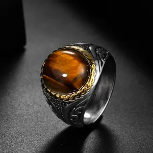 Vintage men's stainless steel ring with oval tiger eye stone and engraved scroll pattern