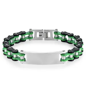 Macro detail of bike chain bracelet showing the stainless steel clasp and engraving