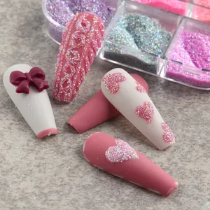 Macro detail of mixed nail glitter powder with 3D heart and sweater texture designs