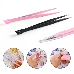 Pince à ongles double embout avec tête en silicone en rose et noir acier inoxydable