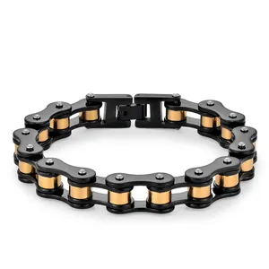 Detail of industrial bicycle chain bracelet in matte black and polished gold finish