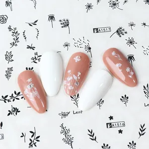 Floral nail stickers featuring black leaves and bird patterns on pink and white nails