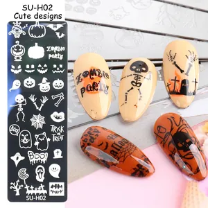 Detail showing Halloween nail stamping plate with pumpkins, ghosts and skulls patterns