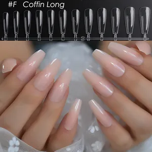 Detail view of 12 sizes of transparent long coffin false nails with pink glossy finish