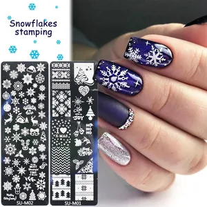 Christmas nail stamping plates featuring snowflakes and reindeer for holiday manicure