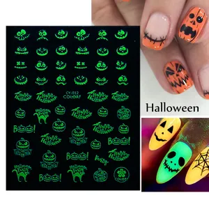 Luminous Halloween nail stickers with glowing pumpkin and ghost patterns