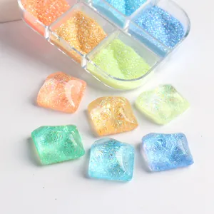 Six-color nail art glitter set in a box with sparkling orange and gold sugar powder