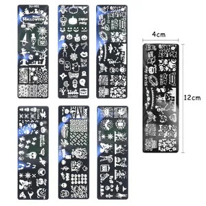 Set of 6 Halloween nail stamping plates featuring pumpkins and skeletons in stainless steel