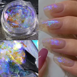 Macro detail of iridescent aurora nail sequins with application tool and finished manicure