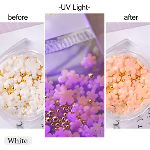UV light sensitive color changing flower nail charms transition from white to pink and orange