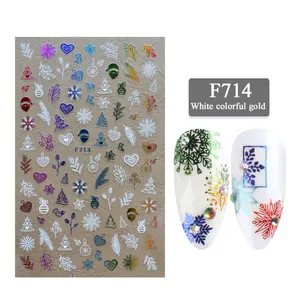 Detail van F714 3D kerst nagelstickers met gouden sneeuwvlokken en rendierpatroon