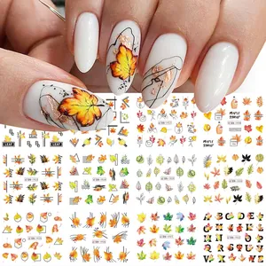 Detail of autumn maple leaf and squirrel water transfer nail art stickers set