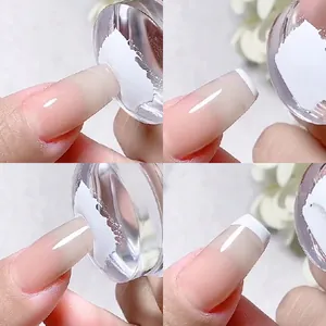Step-by-step macro view showing transparent silicone nail stamper creating a French tip look