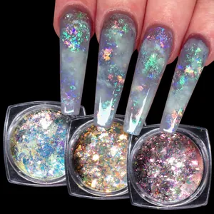 Detailed view of aurora opal nail glitter flakes in three iridescent colors on black background