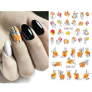 Autumn maple leaf and squirrel nail stickers featuring warm orange seasonal patterns