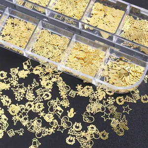 Décorations à ongles de Noël dorées avec flocons et étoiles dans un coffret de rangement