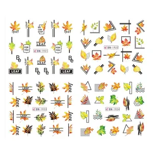 Autumn nail water decals featuring maple leaves, squirrels, and mushrooms in warm orange tones