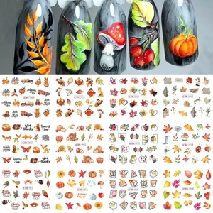 Autumn nail art stickers featuring pumpkins and leaves on manicured nails with 12 SKU designs