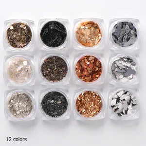 Top view of 12-color nail art mica flakes set in clear jars for professional decoration