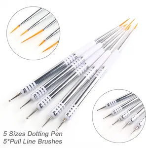 Dettaglio di 5 pennelli nail art a doppia punta con punte per dotting e setole arancioni