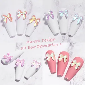 3D aurora resin bow nail art decorations in various iridescent colors on nails