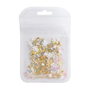 Kit de decoración de uñas con estrellas lunas doradas copos y perlas blancas