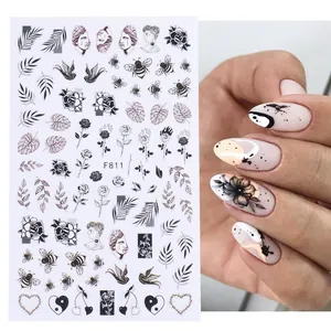 Detail of F811 black floral and Greek sculpture nail stickers with a model demonstration