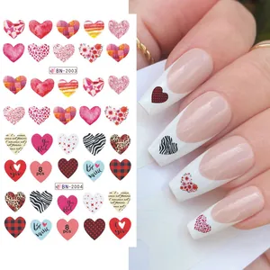 Water transfer nail stickers with red hearts and animal prints for Valentine's nail art