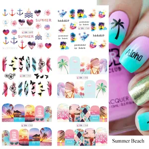 Summer beach theme water transfer nail art stickers featuring palms and flamingos