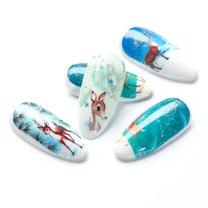 Christmas reindeer and snowflake press-on nails set with festive holiday patterns
