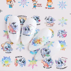 Winter nail stickers set featuring cartoon cats and snowflakes for DIY manicure art