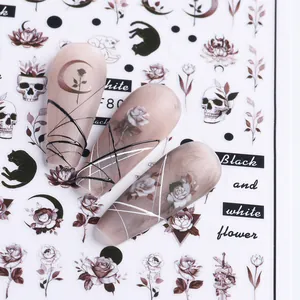 Gothic black and white nail art stickers with cats, skulls and roses patterns