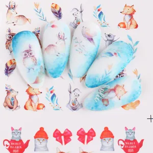 Detailed water slide nail decals featuring forest animals like owls and foxes with teapot designs