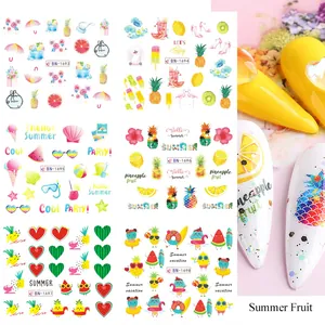 Detailed sheet showing summer fruit and flamingo nail art stickers for manicure