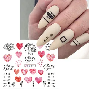 Detail view of Valentine nail decals BN-2010 featuring red hearts and romantic text art