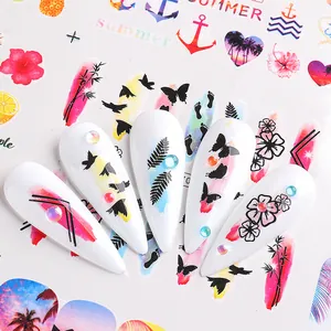 Summer nail art stickers with bird and floral silhouette designs and rhinestones