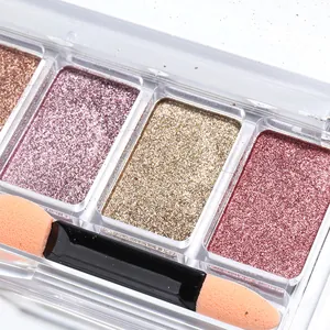 Macro view of 4-color solid mirror chrome nail powder palette with dual-ended sponge brush