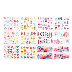 Set of 12 vibrant summer nail art stickers featuring tropical fruits and beach designs