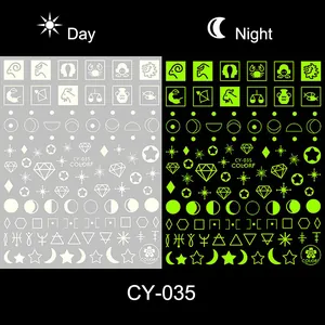 Luminous nail stickers with zodiac and moon patterns showing day and night glow effect