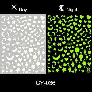 Luminous glow-in-the-dark nail stickers featuring stars, moon, and heart shapes